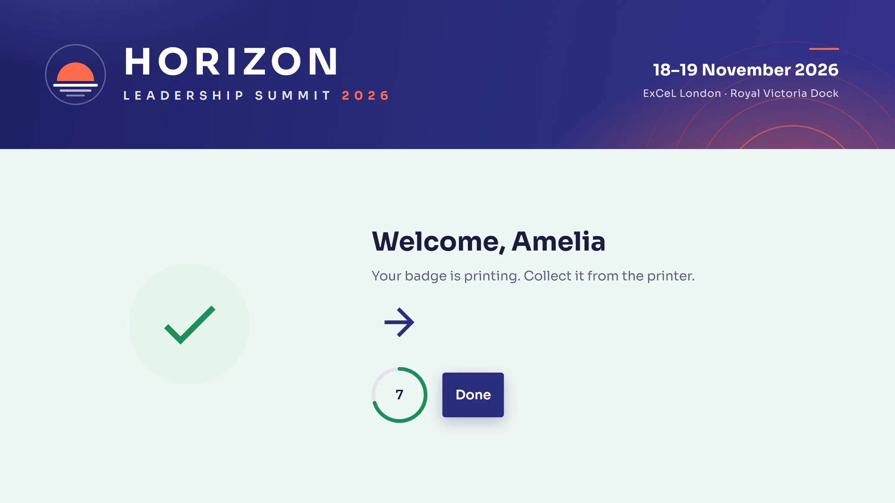 Kiosk welcome screen telling the attendee their badge is printing